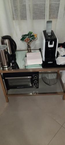 a counter with a toaster and a printer on it at Villa Lara in Marsaglia
