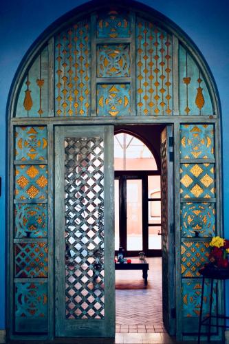 an entrance to a room with a gate with a bench at Radisson Blu Resort El Quseir in Quseir