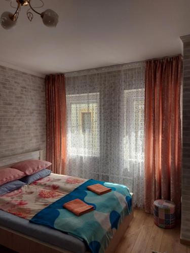 Postel nebo postele na pokoji v ubytování Apartman "Toskana"