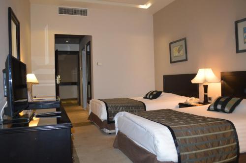 Katil atau katil-katil dalam bilik di Century Park Hotel