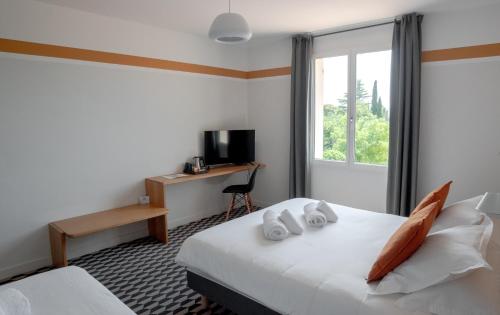 Postel nebo postele na pokoji v ubytování La Maison des Ocres - Provence