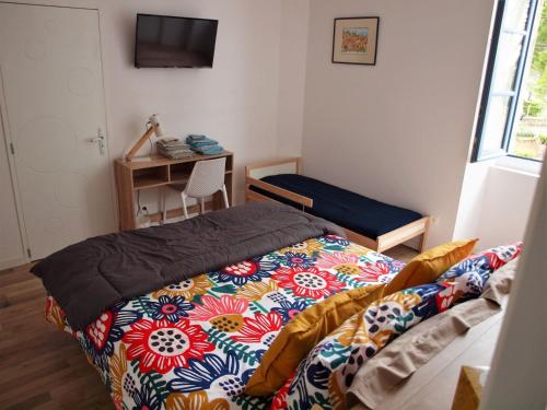 Postel nebo postele na pokoji v ubytování Gites de l'écluse "Au fil de l'Aude"