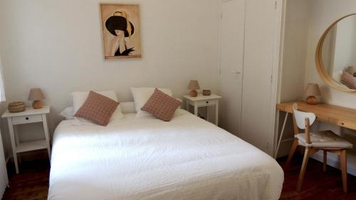 Postel nebo postele na pokoji v ubytování Cœur de Vichy