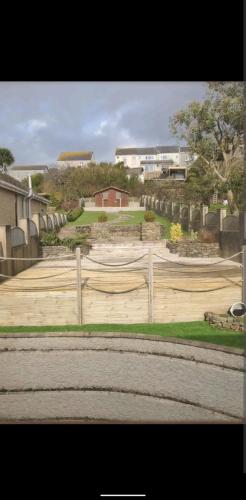 a view of a skate park with a skateboard ramp at Sunset cottage in Burry Port
