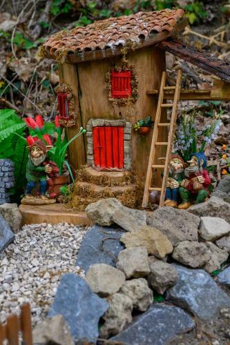 a model of a small house with a ladder and a ladder at Agriturismo le Fontane - Lago di Bolsena in Grotte di Castro