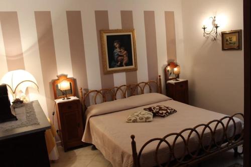 En eller flere senge i et værelse på Casa di Campagna Angolo Di Pace