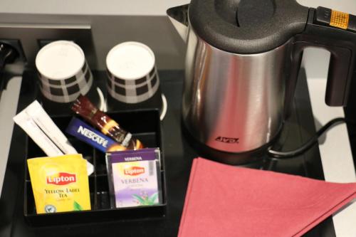 Kemudahan buat kopi dan teh di Hôtel Boutique Richelieu, Lyon Gare Part-Dieu