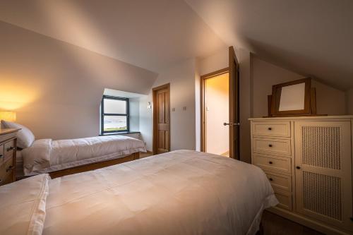 Postel nebo postele na pokoji v ubytování Tern House