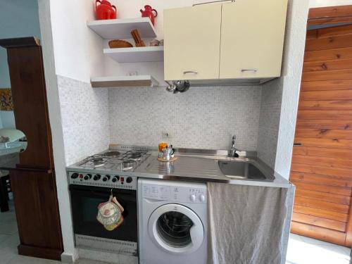 Kuchyňa alebo kuchynka v ubytovaní Casa Bouganville Pinus Village