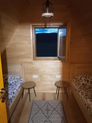 Postel nebo postele na pokoji v ubytování BUNGALOVI TIM