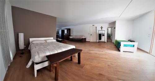 Postel nebo postele na pokoji v ubytování B&B Baratoff