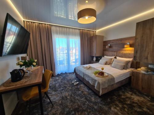 Кровать или кровати в номере BALTIC RESIDENCE