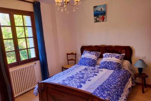 Ένα ή περισσότερα κρεβάτια σε δωμάτιο στο Bel appartement T4 dans maison basque