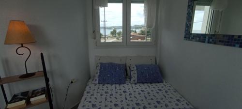 Postel nebo postele na pokoji v ubytování Sunset Beach House Possidi