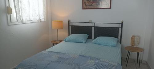 Postel nebo postele na pokoji v ubytování Sunset Beach House Possidi