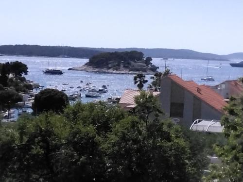 a view of a harbor with boats in the water at Apartments & Rooms Zlatica Hvar in Hvar