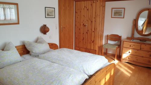 Postel nebo postele na pokoji v ubytování Ferienwohnung Westerheide