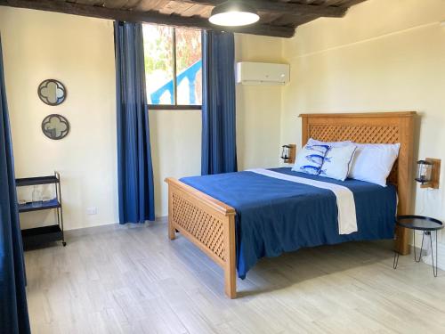 Łóżko lub łóżka w pokoju w obiekcie Maresía Village Cayo Arena - Habitación #2