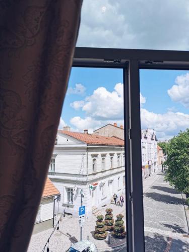 a view from a window of a city street at Apartments Vitenberg in Cēsis