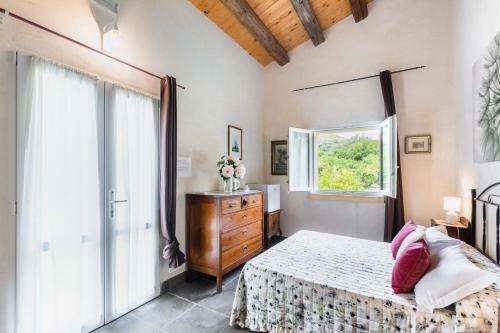 Agriturismo Val Di Notoにあるベッド