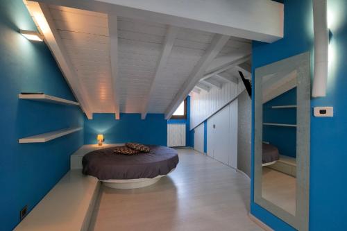 Tempat tidur dalam kamar di Villetta dei Pascoli