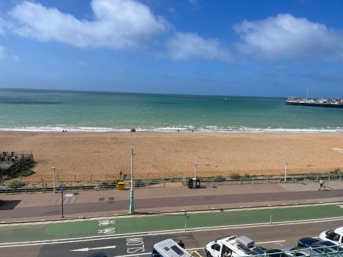 a view of a beach and the ocean at The 21 Luxury Seaside Apartment in Brighton & Hove