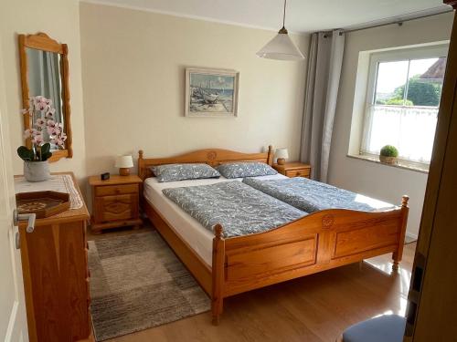 Ένα ή περισσότερα κρεβάτια σε δωμάτιο στο Meine Ferienwohnung