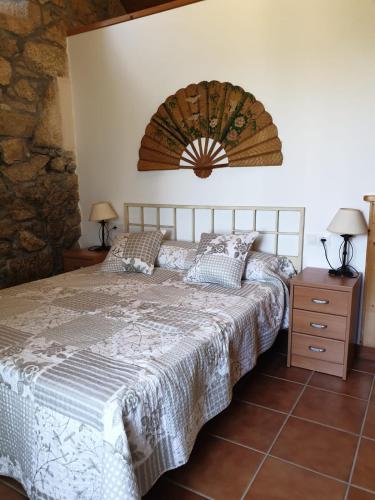 Un pat sau paturi într-o cameră la Casiñas As Covas
