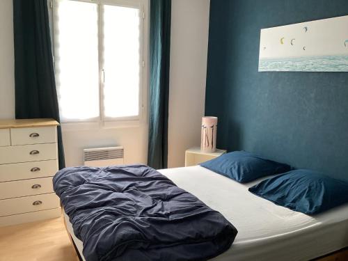 Postel nebo postele na pokoji v ubytování Maison chaleureuse 2 chambres