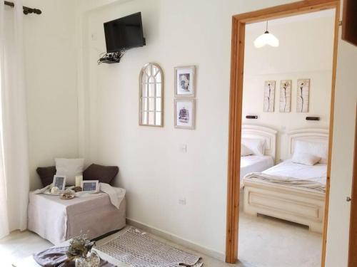 Postel nebo postele na pokoji v ubytování Corfu Escape Four