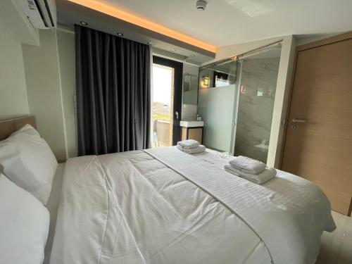Katil atau katil-katil dalam bilik di Artline Luxury Suites