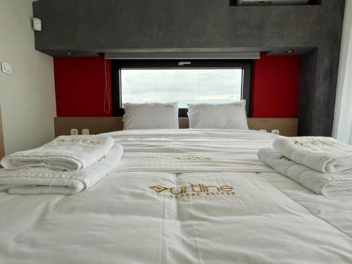 Katil atau katil-katil dalam bilik di Artline Luxury Suites