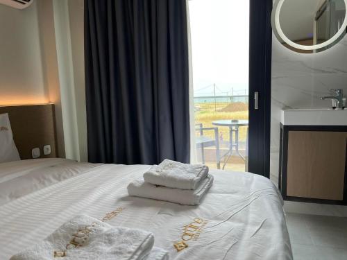 Katil atau katil-katil dalam bilik di Artline Luxury Suites
