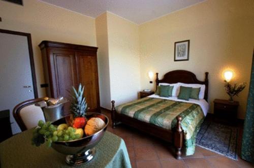 เตียงในห้องที่ Hotel Nastro Azzurro
