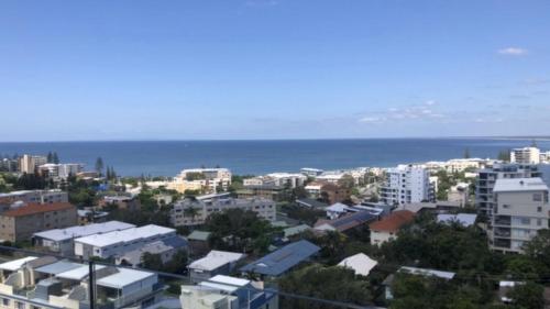 a city skyline with the ocean in the background at #24 K I G Heights, Kings Beach - Stunning Views in Caloundra