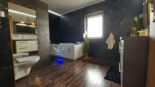 Kúpeľňa v ubytovaní Dom nad jeziorem