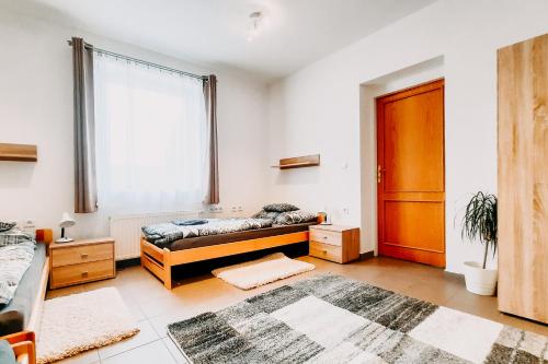 Postel nebo postele na pokoji v ubytování Apart Samont