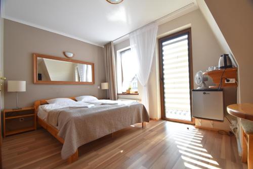 Fotografie z fotogalerie ubytování Aparthotel Mikołajki v destinaci Mikołajki
