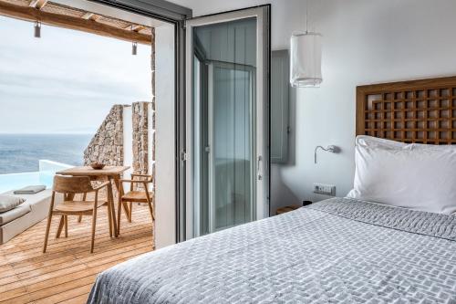 Postel nebo postele na pokoji v ubytování Alissachni Mykonos