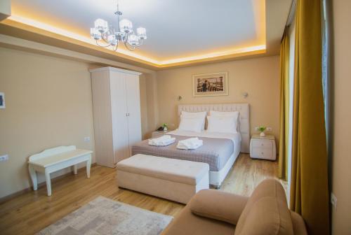 Postel nebo postele na pokoji v ubytování Christi's Hotel Borova
