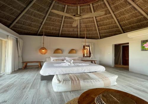 Ein Bett oder Betten in einem Zimmer der Unterkunft The Mak Trat