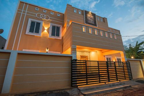 a house with a gate in front of it at Saffron Vilva in Puducherry