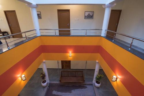 an overhead view of a staircase in a building at Saffron Vilva in Puducherry