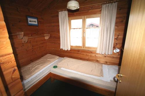 En eller flere senger på et rom på Ferienpark Lauterdörfle 7