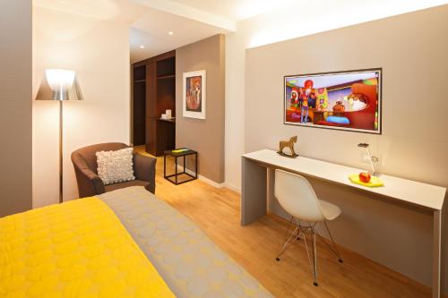 TV a/nebo společenská místnost v ubytování Hotel Rössli
