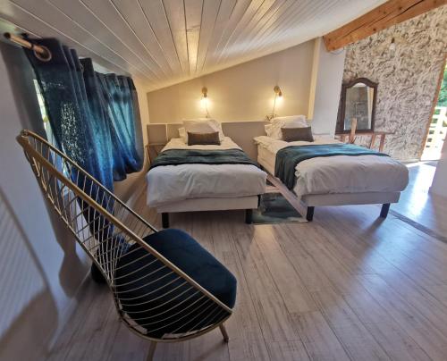 Ένα ή περισσότερα κρεβάτια σε δωμάτιο στο Residence La Borde