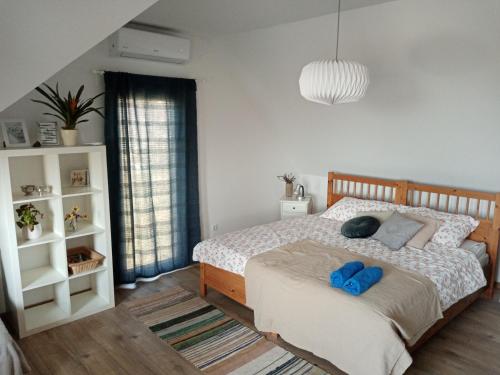 Posteľ alebo postele v izbe v ubytovaní MM Apartman