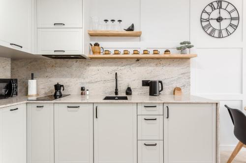 Kuchyňa alebo kuchynka v ubytovaní Rent like home - Dwie Motławy II