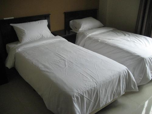 Кровать или кровати в номере Festival Boutique Hotel