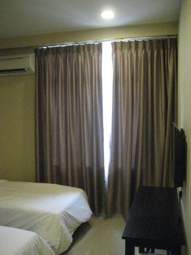 Кровать или кровати в номере Festival Boutique Hotel